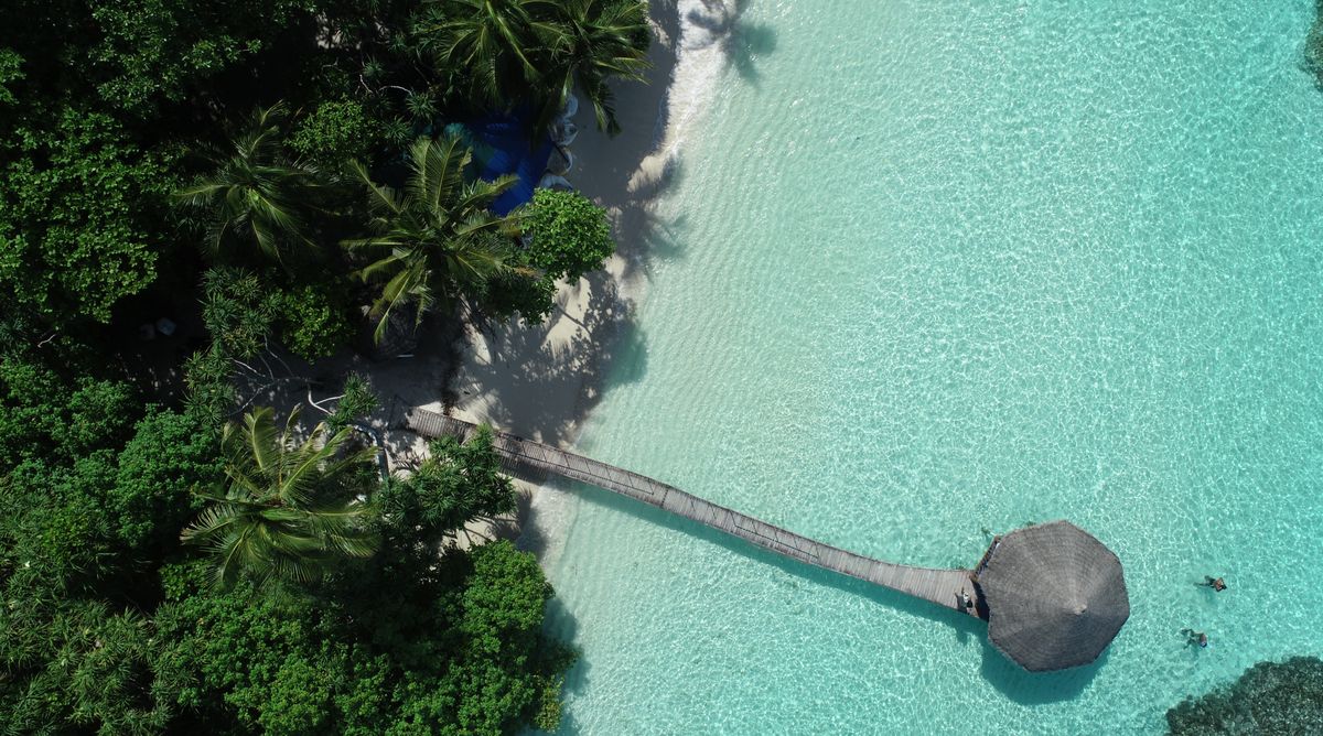 Overwater walkway to a tropical island